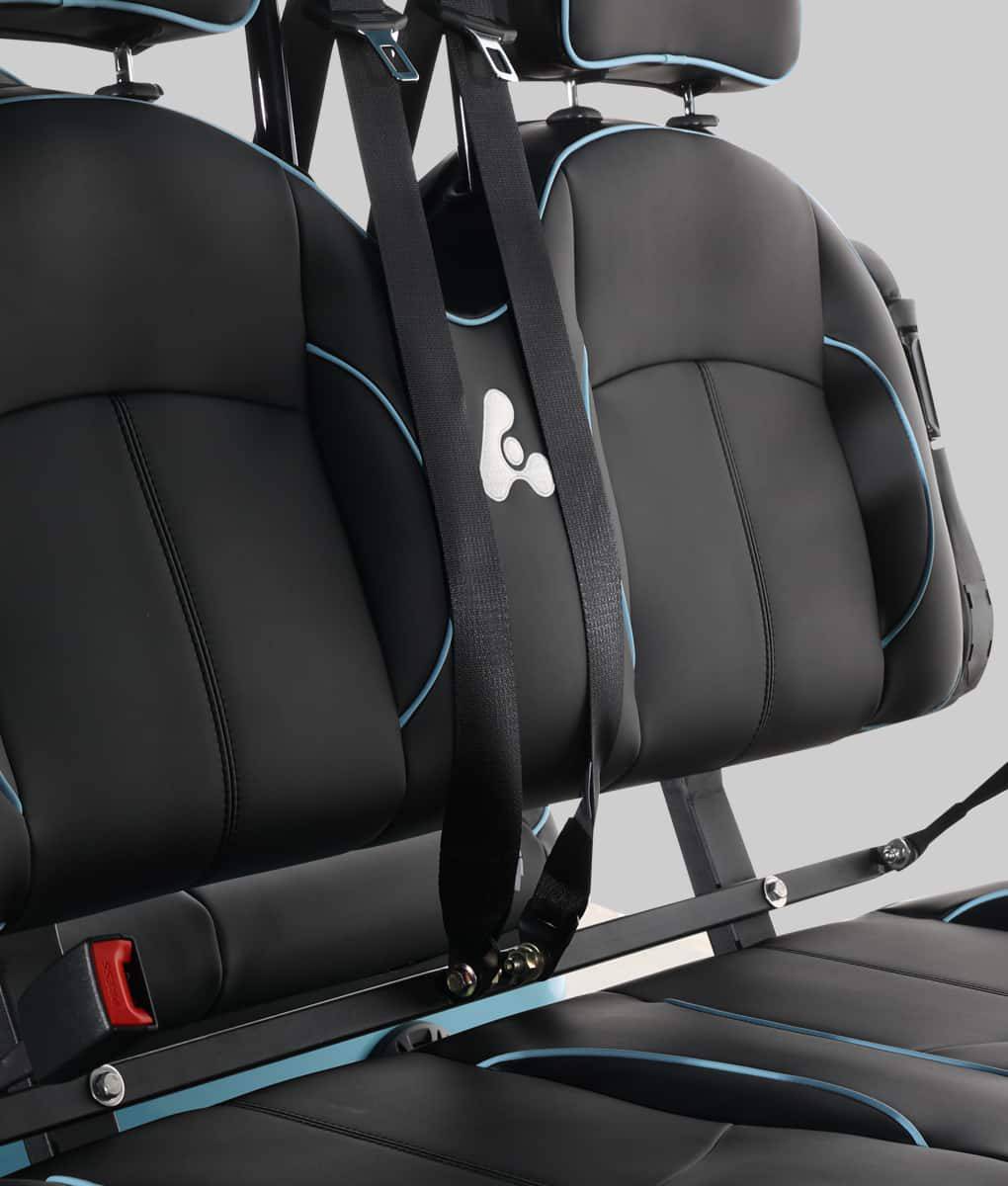 Close-up of the captain's chair seating and three-point seatbelt details in the Bintelli ActivEV Pulse golf cart.
