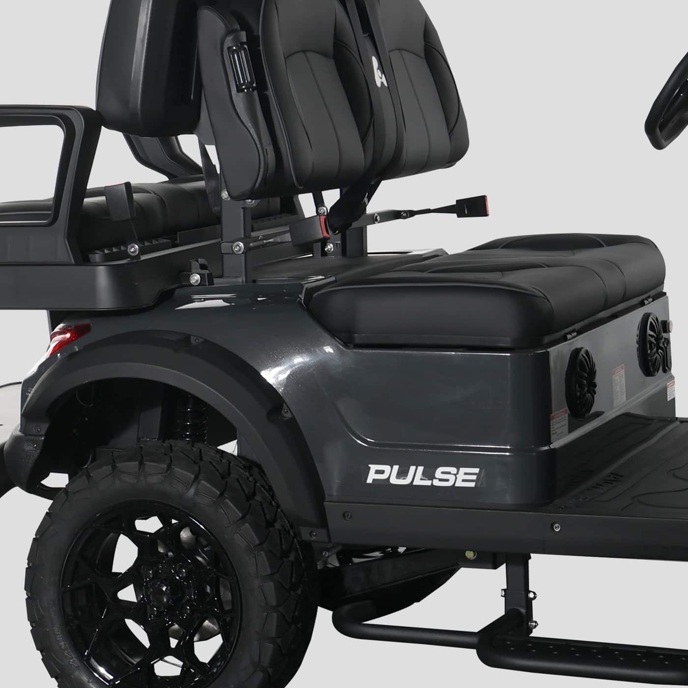 Close-up detail of the rear seating and side body of the Bintelli ActivEV Pulse golf cart.
